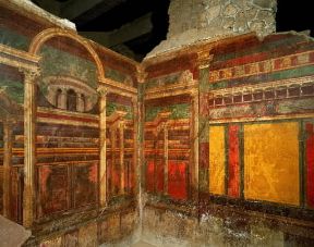 Pompei. Ambiente della Villa dei Misteri affrescato in II stile pompeiano.De Agostini Picture Library/A. Dagli Orti
