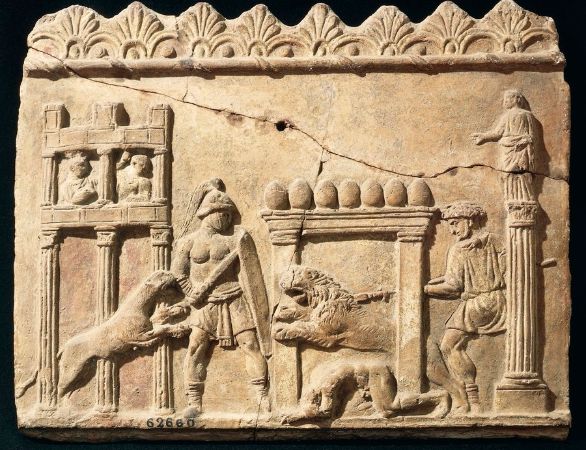 Gladiatori, scena di combattimento su terracotta Civiltà romana, I secolo a.C. Rilievo in terracotta raffigurante un combattimento di leoni e gladiatori nel circo.