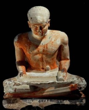 Scriba raffigurato in una statuetta di arte egizia, dell'epoca della IV dinastia (2600-2480 a. C.).De Agostini Picture Library / G. Dagli Orti