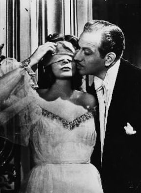Melvyn Douglas con Greta Garbo in una scena del film Ninotchka (1939).De Agostini Picture Library
