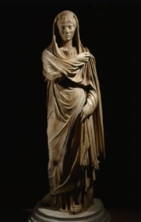 Abbigliamento di una matrona romana in una statua proveniente dall'antica Cirta (Costantina, Museo).De Agostini Picture Library/G. Dagli Orti