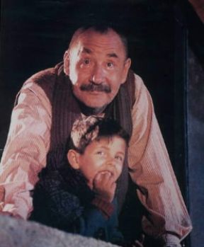 Giuseppe Tornatore. Una scena del film Nuovo Cinema Paradiso del 1989 con Philippe Noiret e Salvatore Cascio.De Agostini Picture Library