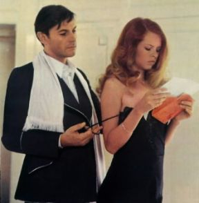 Helmut Berger con Teresa Ann Savoy in Salon Kitty (1976) di Tinto Brass.De Agostini Picture Library